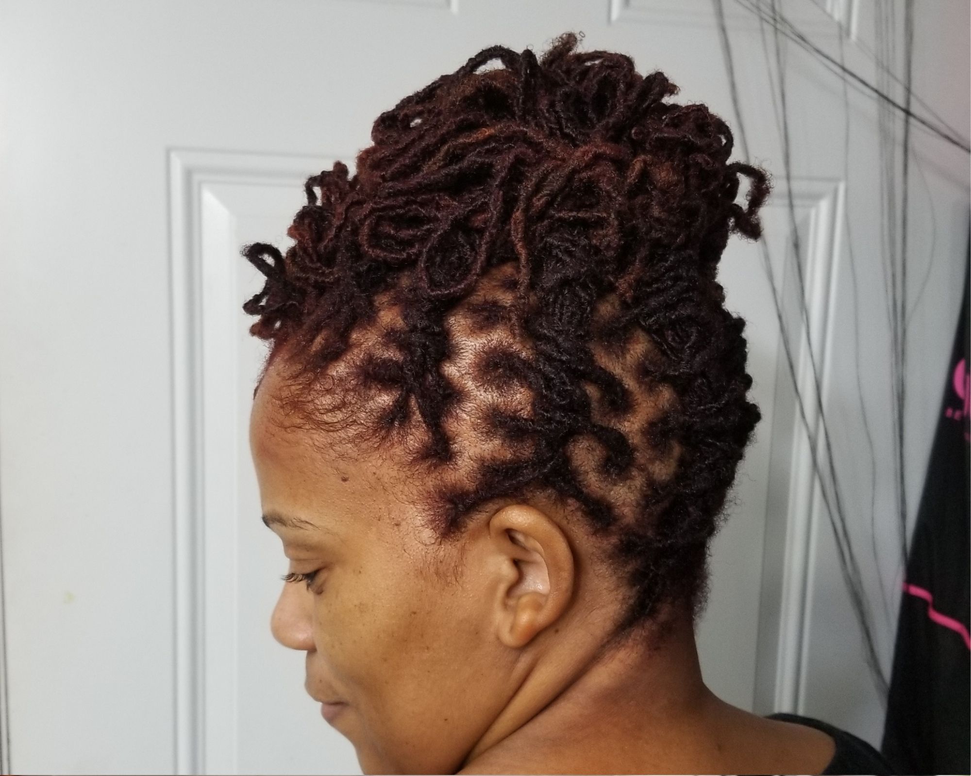 girl with locs style on medium hair